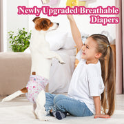 Jack Russell Terrier standing on hind legs playing with a girl at home while wearing Dono newly upgraded breathable disposable female dog diaper in pink floral pattern