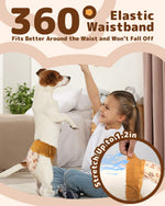 Jack Russell Terrier standing on hind legs playing with young girl indoors wearing Dono 