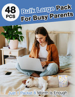 Woman working on laptop on bed with Jack Russell Terrier resting beside a Dono male dog wrap diaper package, captioned 